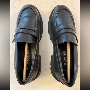 Woman’s chunky heel loafer